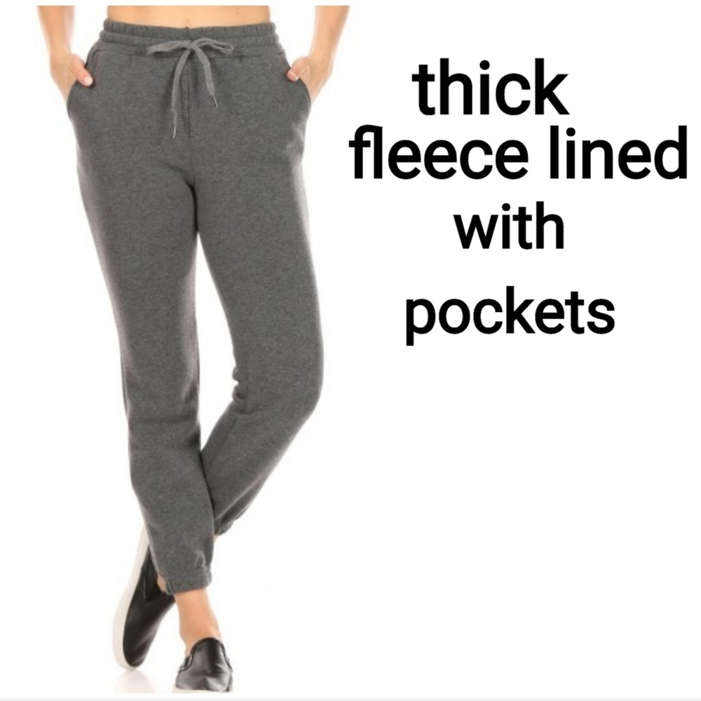 Thick fleece lined sweatpants with drawstrings and pockets
